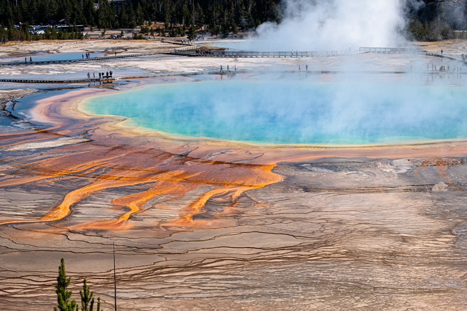 Close-up view of the vibrant colors and mineral textures of Grand Prismatic Spring from Fairy Falls Overlook in Yellowstone National Park.