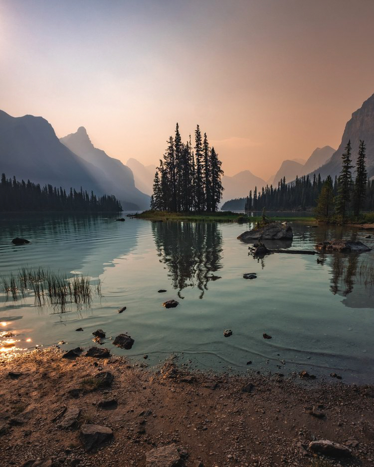 view of mountains and mountain lake with an island.