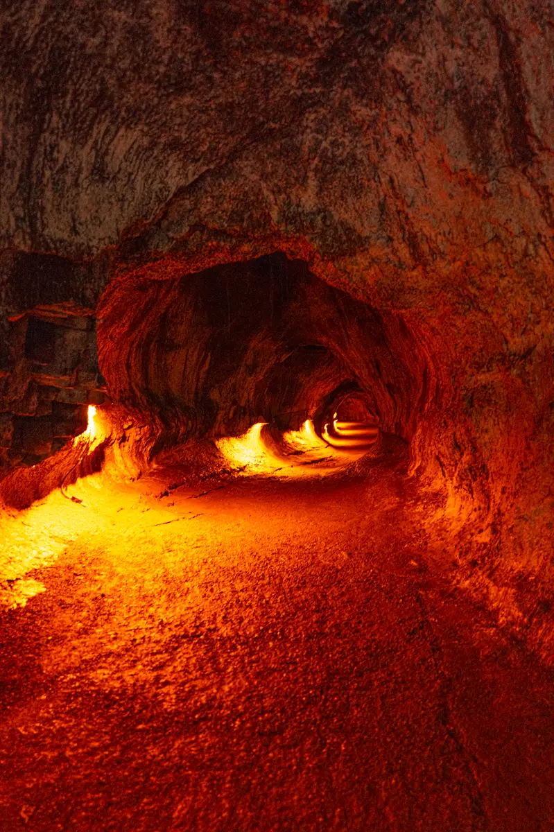 Thiurston lava tube on big Island Hawaii. cave formed by lava lit by orange lights