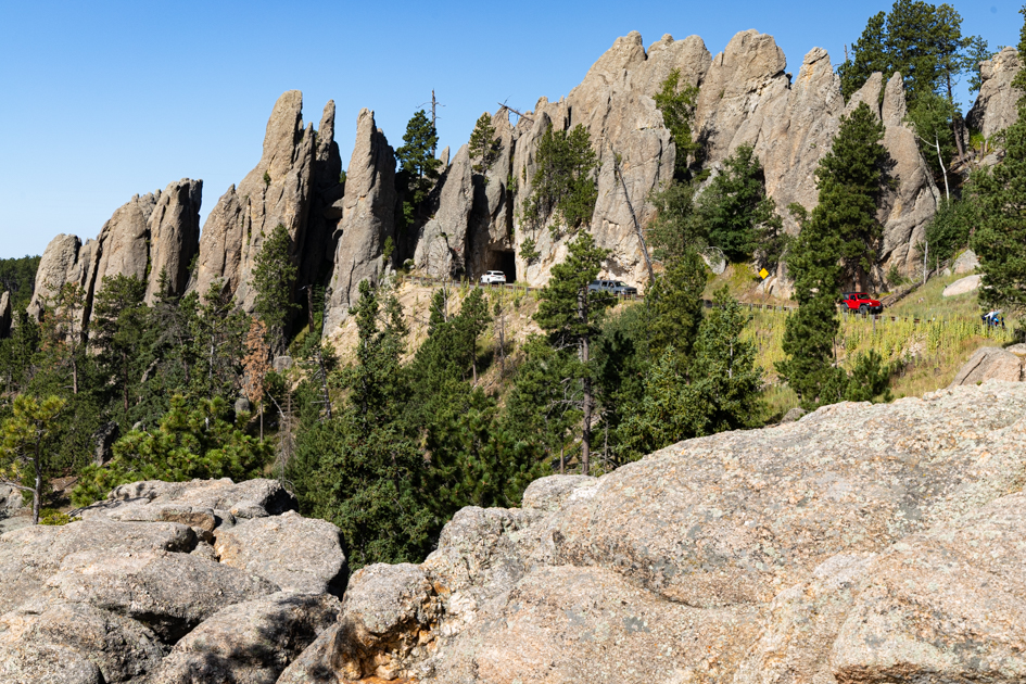Dramatic granite spires of the Needles under a clear blue sky in Custer State Park, South Dakota