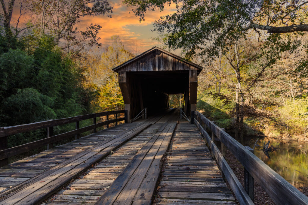 Close-up of rustic wooden boards on the Red Oak Creek Covered Bridge in Georgia.