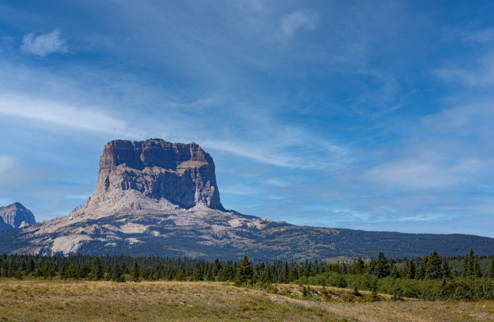 Chief Mountain rising above the plains with dramatic lighting in Glacier National Park