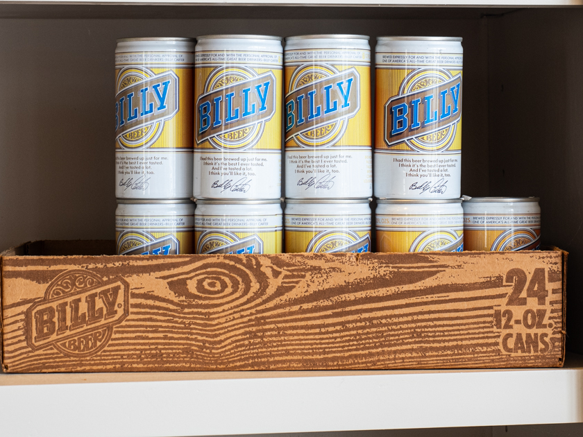 Billy Beer cans on display inside Billy Carter’s gas station in Plains, Georgia, representing a quirky piece of 1970s American history.
