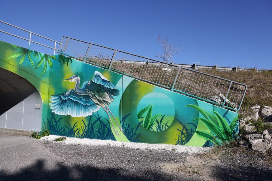 Colorful mural painted along the Pinellas Trail bike path in Florida