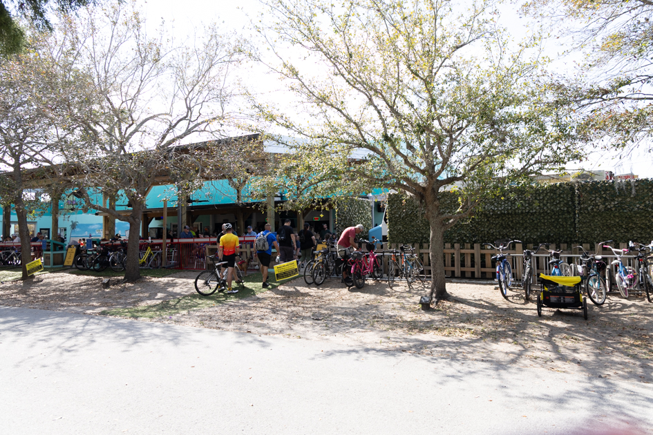 Bike racks filled with colorful bicycles in downtown Dunedin, Florida
