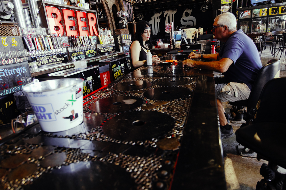 Close-up of the Full Throttle Saloon bar top made from motorcycle gears and parts.