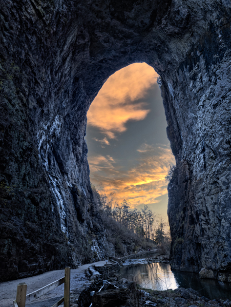 Sunset light filtering through Natural Bridge in Virginia’s Shenandoah Valley
