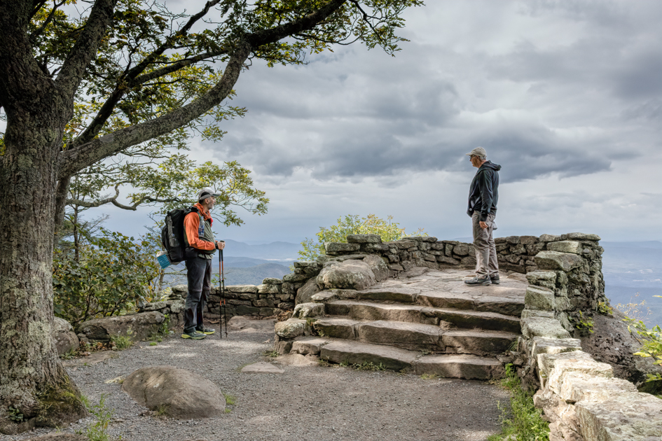 Man speaking with a 73-year-old hiker on the Appalachian Trail near Thunder Ridge Overlook.