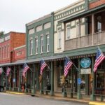 View of the quaint downtown area of Plains, Georgia, featuring historic brick buildings, local shops, and small-town Southern charm.