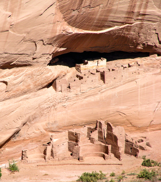 Red sandstone walls of Canyon de Chelly showing the two distinct levels of the canyon.