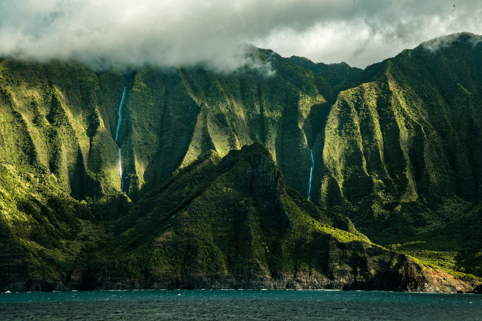 Dramatic Nā Pali Coast cliffs rising from the Pacific Ocean on Kauai, Hawaii