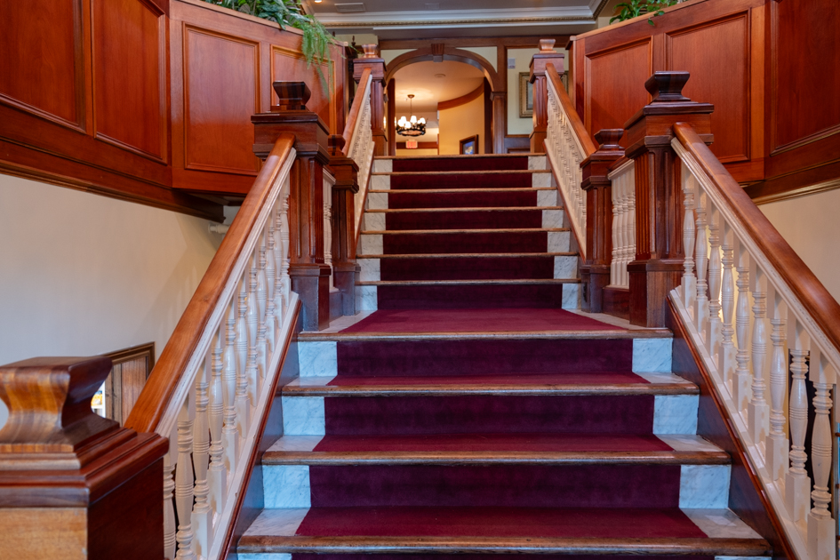 Staircase leading to the lobby of Mirror Lake Inn in Lake Placid, New York.
