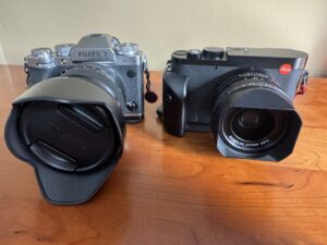 picture of Leica Q3 and Fuji X-T5 side by side, One-Lens Travel