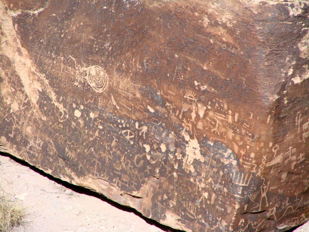 Petroglyphs carved into Newspaper Rock in Petrified Forest National Park, Arizona