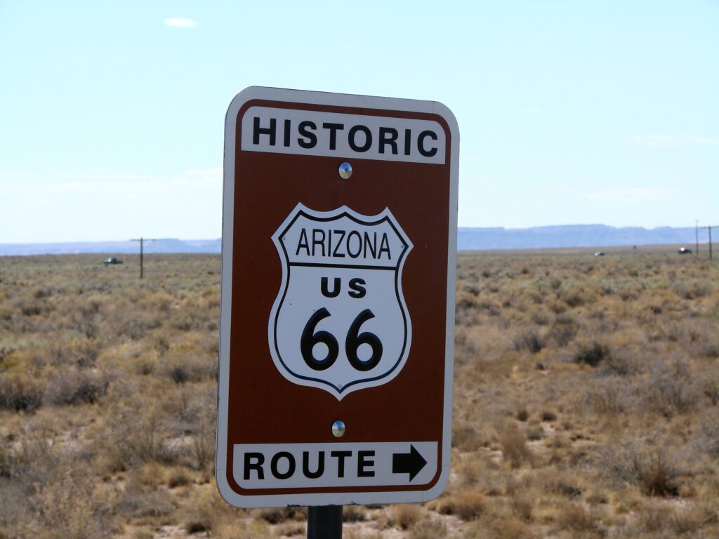 Historic Route 66 sign set in concrete at Petrified Forest National Park in Arizona