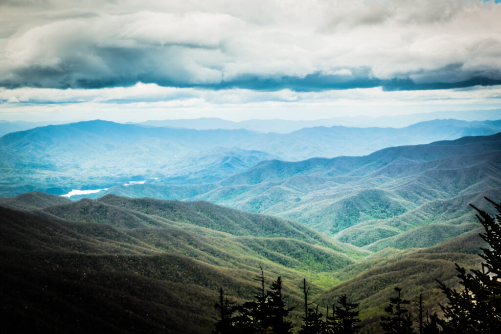 Scenic view of layered Smoky Mountain ridges with soft blue haze.Appalachian Region Travel Guide