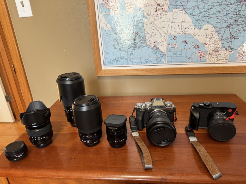 pictures of photography equipment including Leica Q3, Fuji X-T5 and lenses for the fuji.