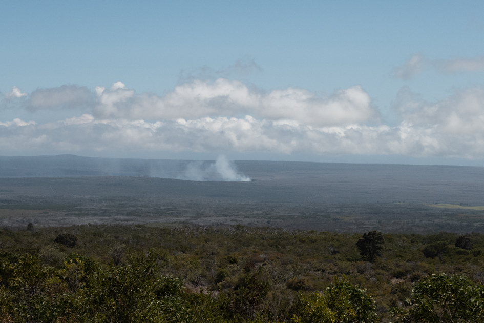 View from Mauna Loa Lookout showing lava fields and sweeping clouds on Hawaii’s Big Island