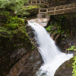 Water cascading through the mossy gorge at Sabbaday Falls along the Kancamagus Highway in New Hampshire’s White Mountains.