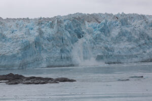 Massive blue wall of Hubbard Glacier in Alaska, viewed from a cruise ship in Disenchantment Bay.