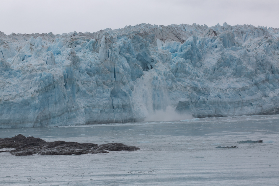 Massive blue wall of Hubbard Glacier in Alaska, viewed from a cruise ship in Disenchantment Bay.