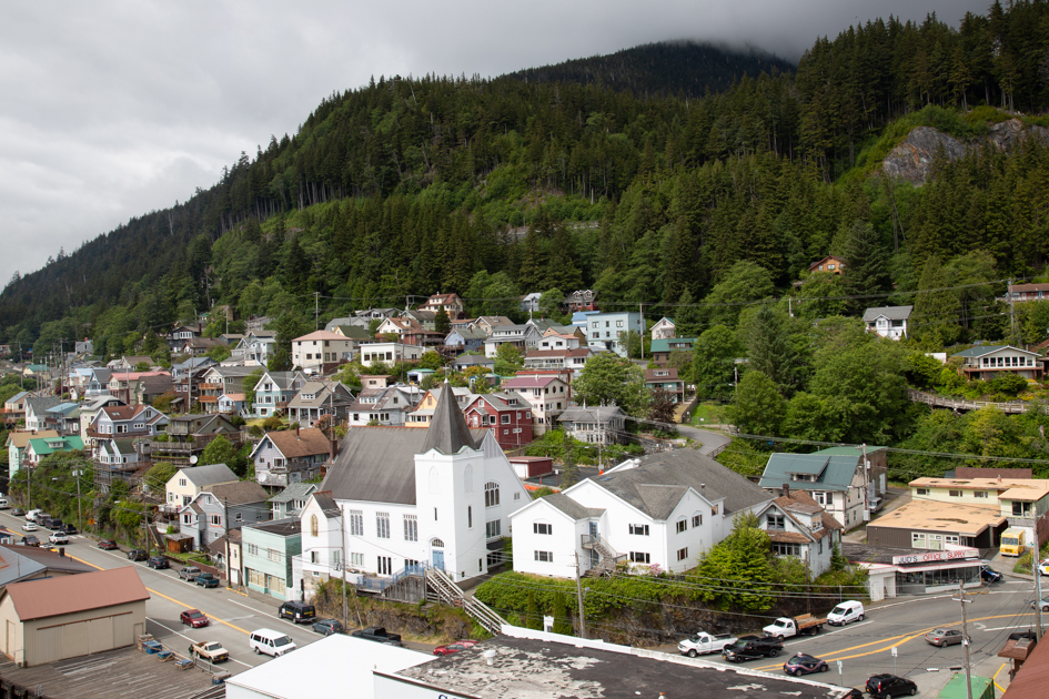 Street view in Ketchikan, Alaska showing steep roads and hillside houses
