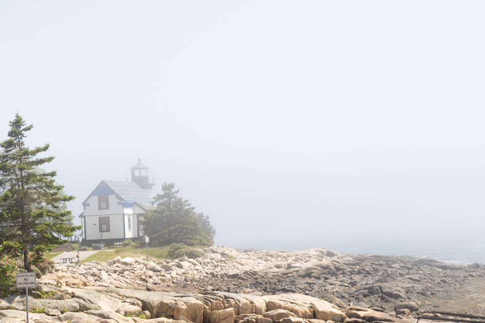 Winter Harbor Lighthouse surrounded by thick fog