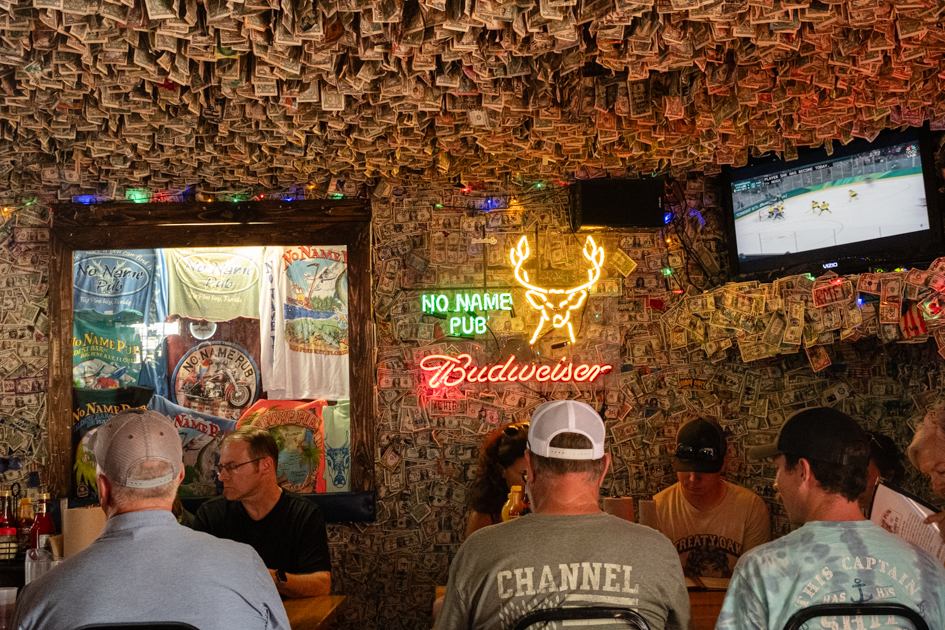 No Name Pub interior walls covered in dollar bills Florida Keys