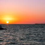 Sunset over the Gulf Coast at Sun Outdoors Key Largo with calm water and soft evening light