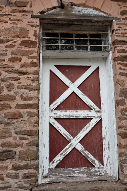 Close-up of the weathered door details at the historic Crossroads Store in Troup County, Georgia.
