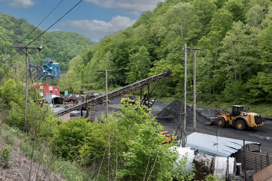 Heavy coal mining equipment in southern West Virginia surrounded by the Appalachian mountains.