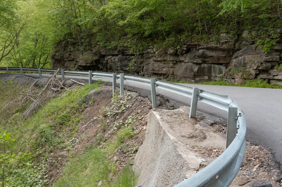 Winding mountain road leading into a remote Appalachian holler in West Virginia.